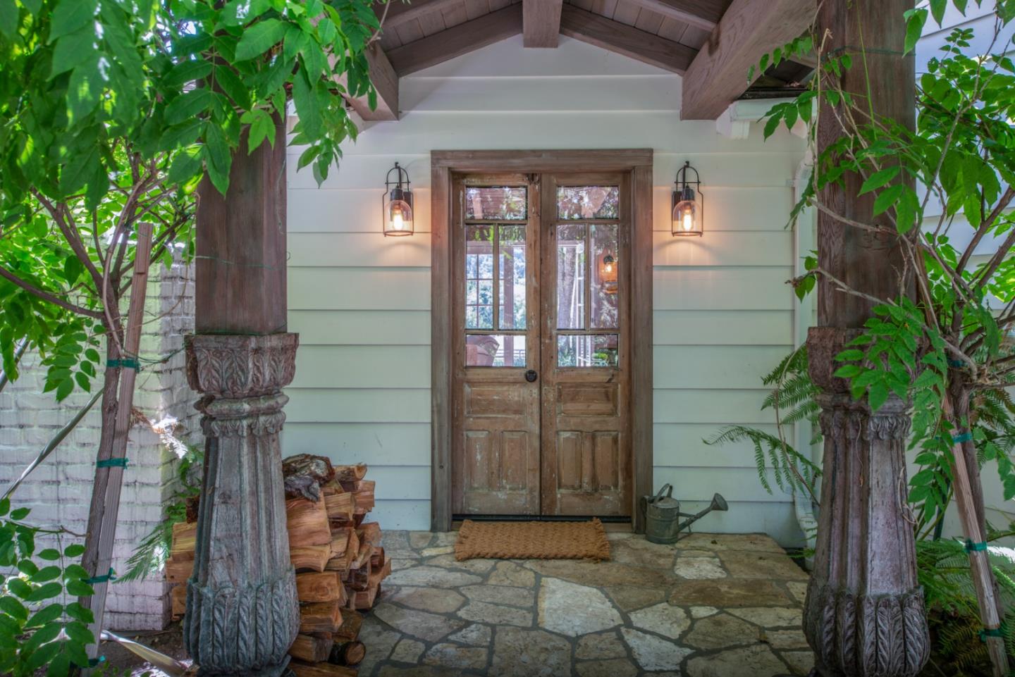 8990 West Carmel Valley Road Carmel Valley, CA 93923 - Photo 6 of 50 a front view of a house with a yard
