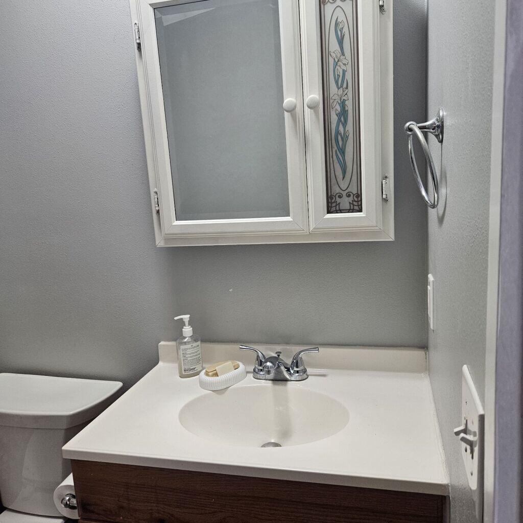 135 Henderson Road, Unit B DeFuniak Springs, FL 32433 - Photo 7 of 12 135 Bathrm Sink