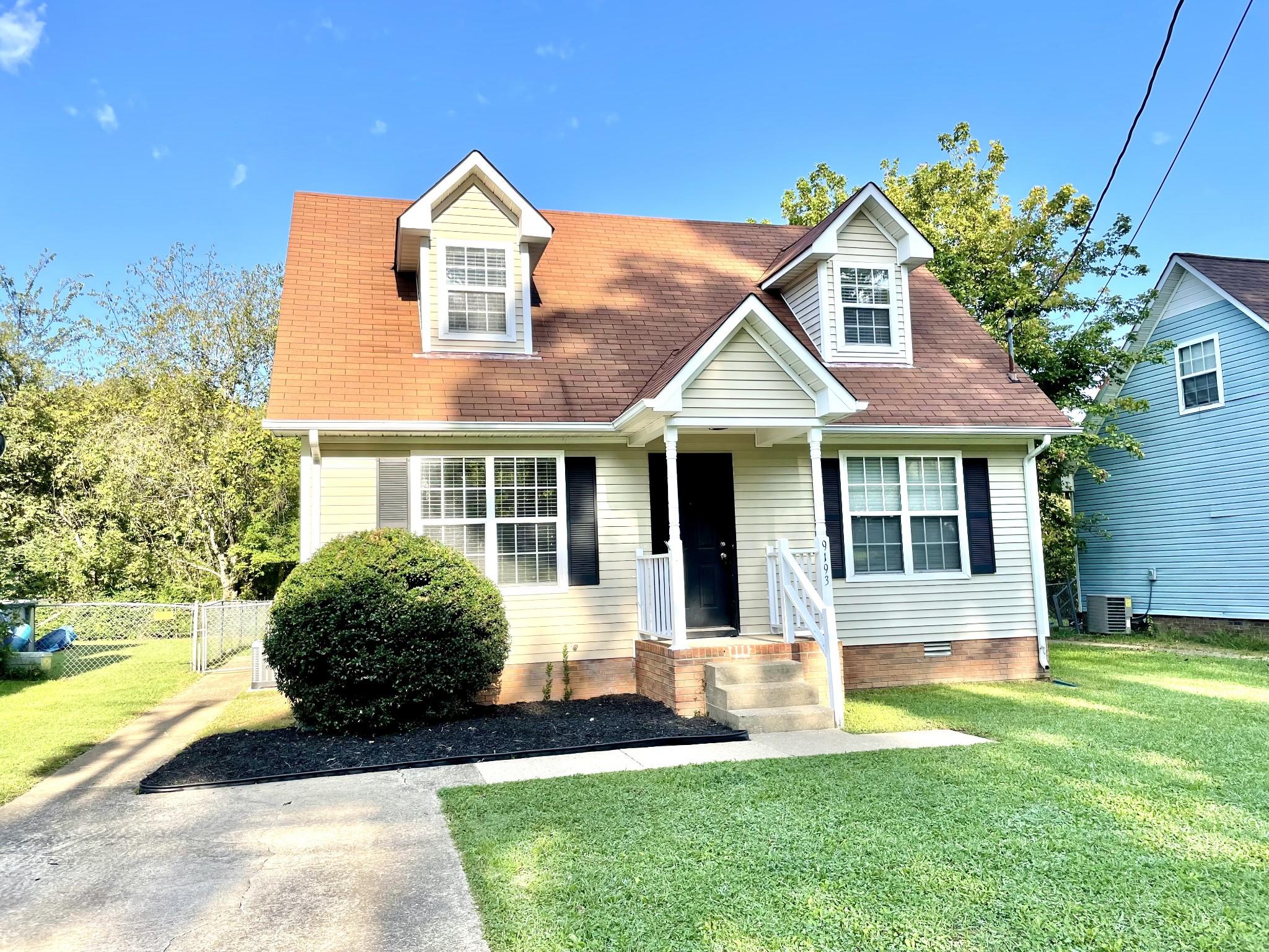 9193 Pembroke Oak Grove Road Oak Grove, KY 42262 - Photo 1 of 16 a front view of a house with a yard