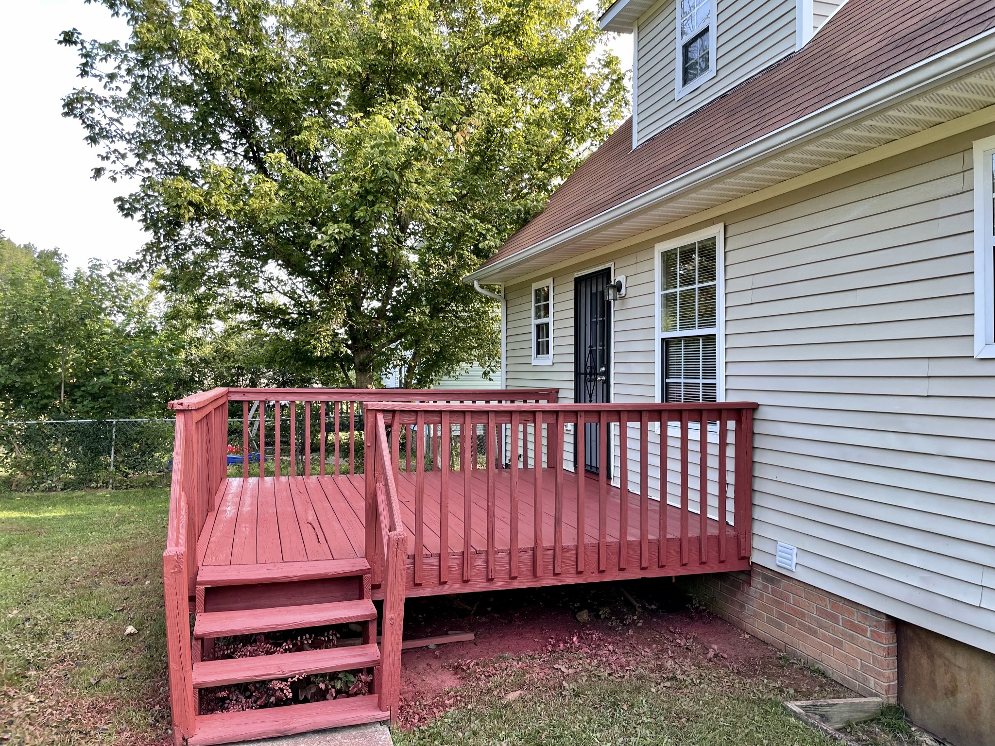 9193 Pembroke Oak Grove Road Oak Grove, KY 42262 - Photo 14 of 16 a view of a wooden deck and a yard