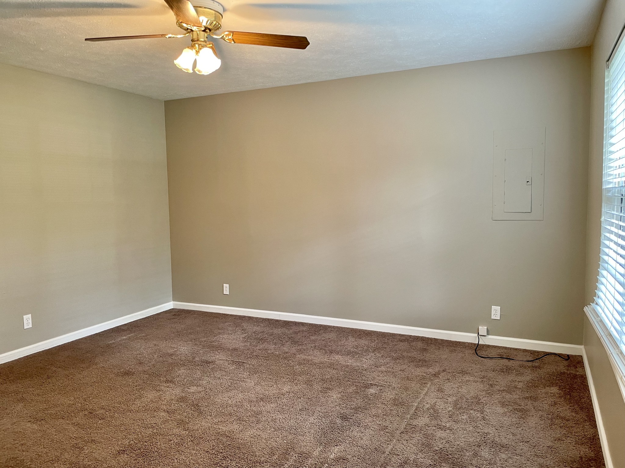 9193 Pembroke Oak Grove Road Oak Grove, KY 42262 - Photo 3 of 16 an empty room with a window