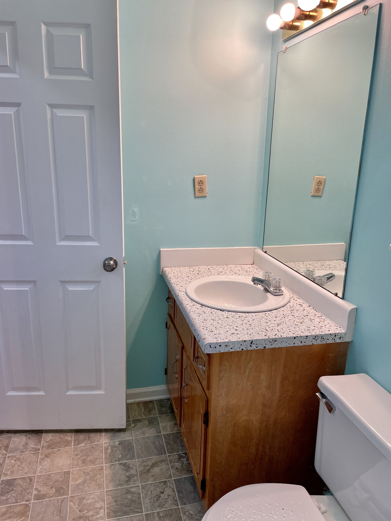 9193 Pembroke Oak Grove Road Oak Grove, KY 42262 - Photo 7 of 16 a bathroom with a granite countertop sink and a mirror