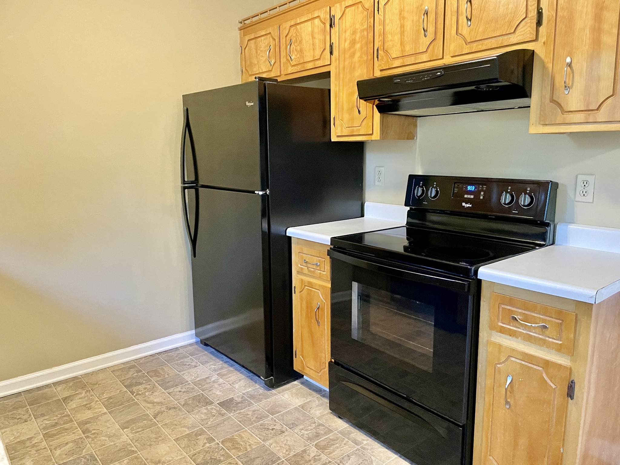 9193 Pembroke Oak Grove Road Oak Grove, KY 42262 - Photo 9 of 16 a kitchen with stainless steel appliances granite countertop a stove and a refrigerator