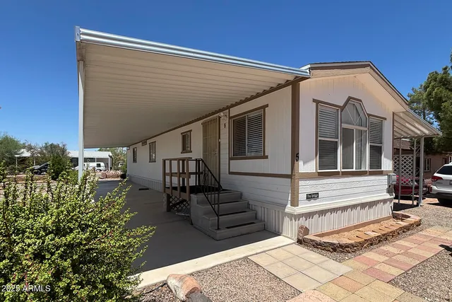a view of a back yard of the house
