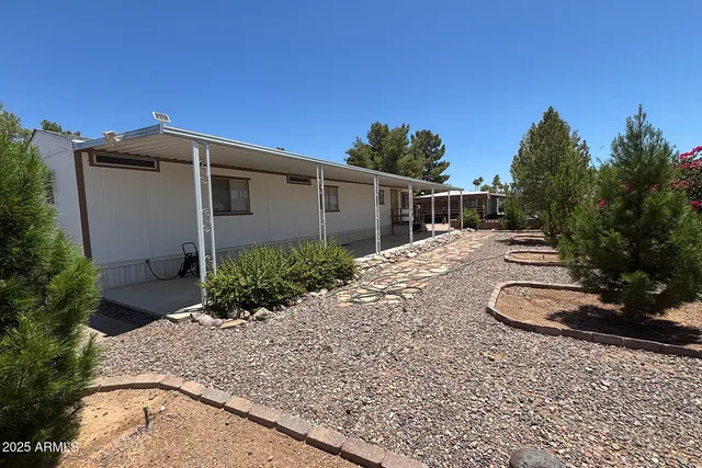 a view of a house with a park