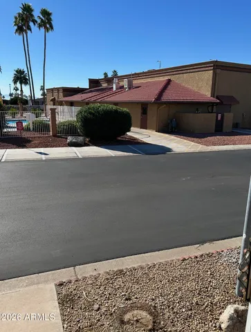 a view of swimming pool with outdoor seating
