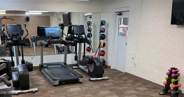 a view of a room with gym equipment