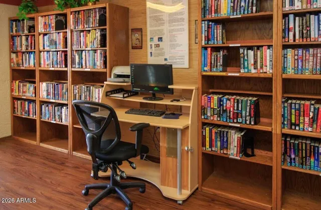 a view of a swimming pool with a lawn chairs