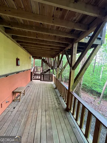 a view of a room with a kitchen
