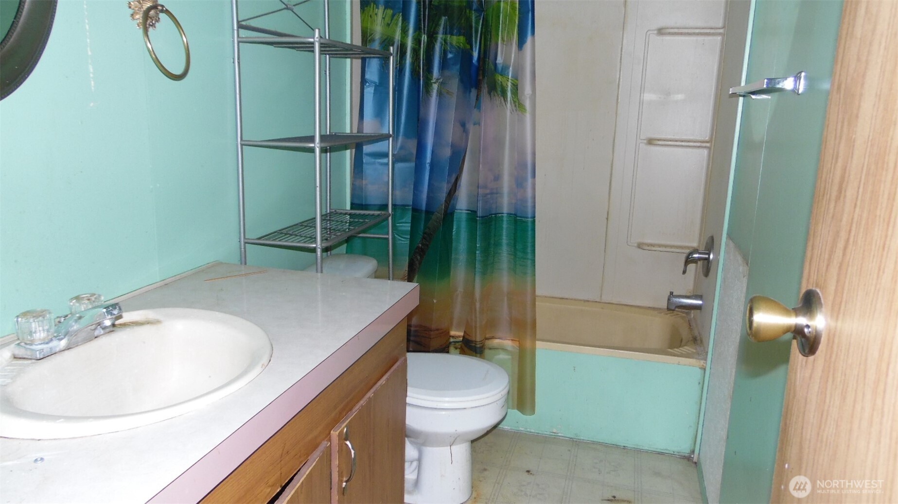 973 Davis Lake Road Morton, WA 98356 - Photo 14 of 23 a bathroom with a sink a toilet and shower