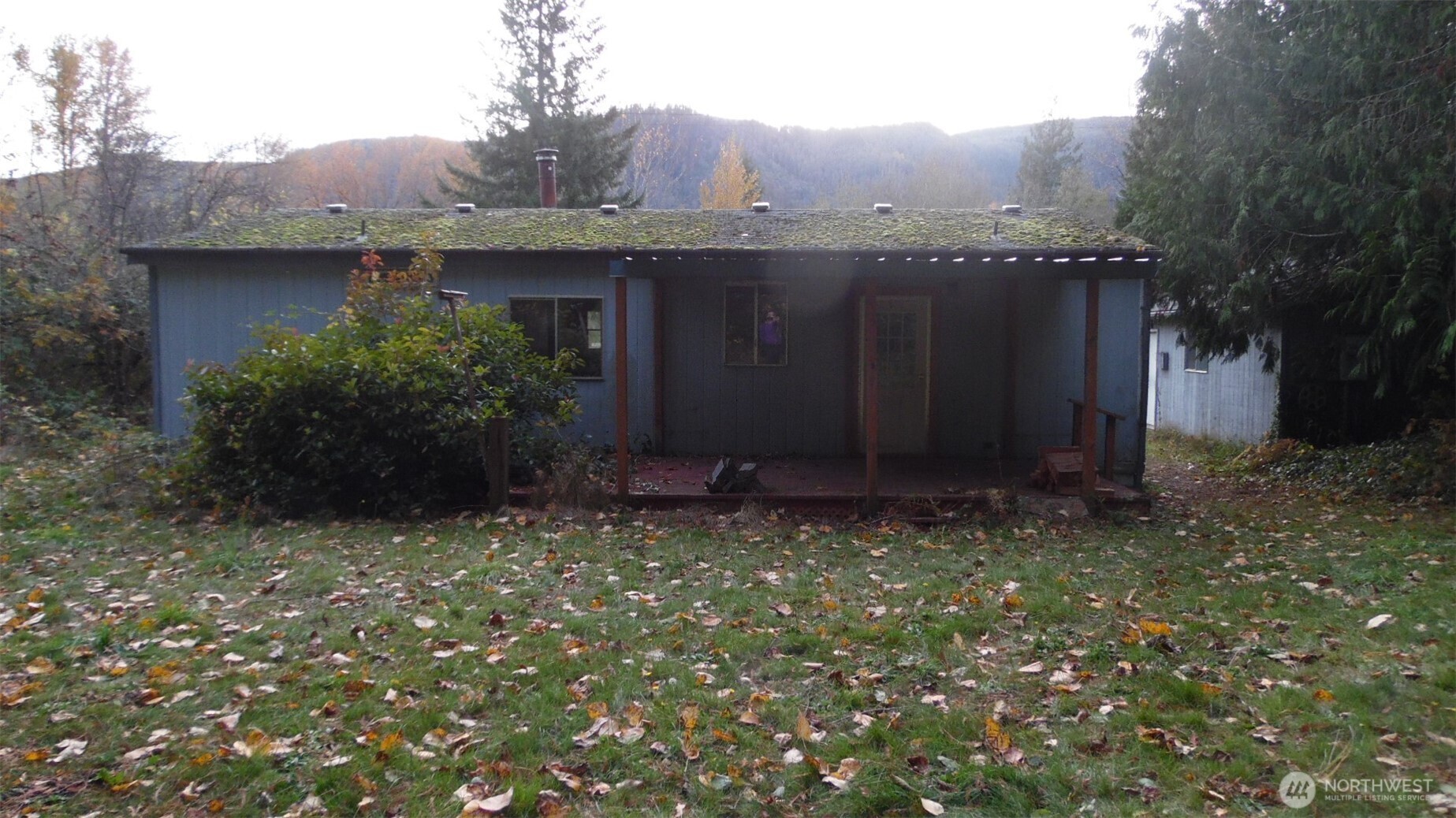 973 Davis Lake Road Morton, WA 98356 - Photo 22 of 23 a view of a barn in the middle of a yard