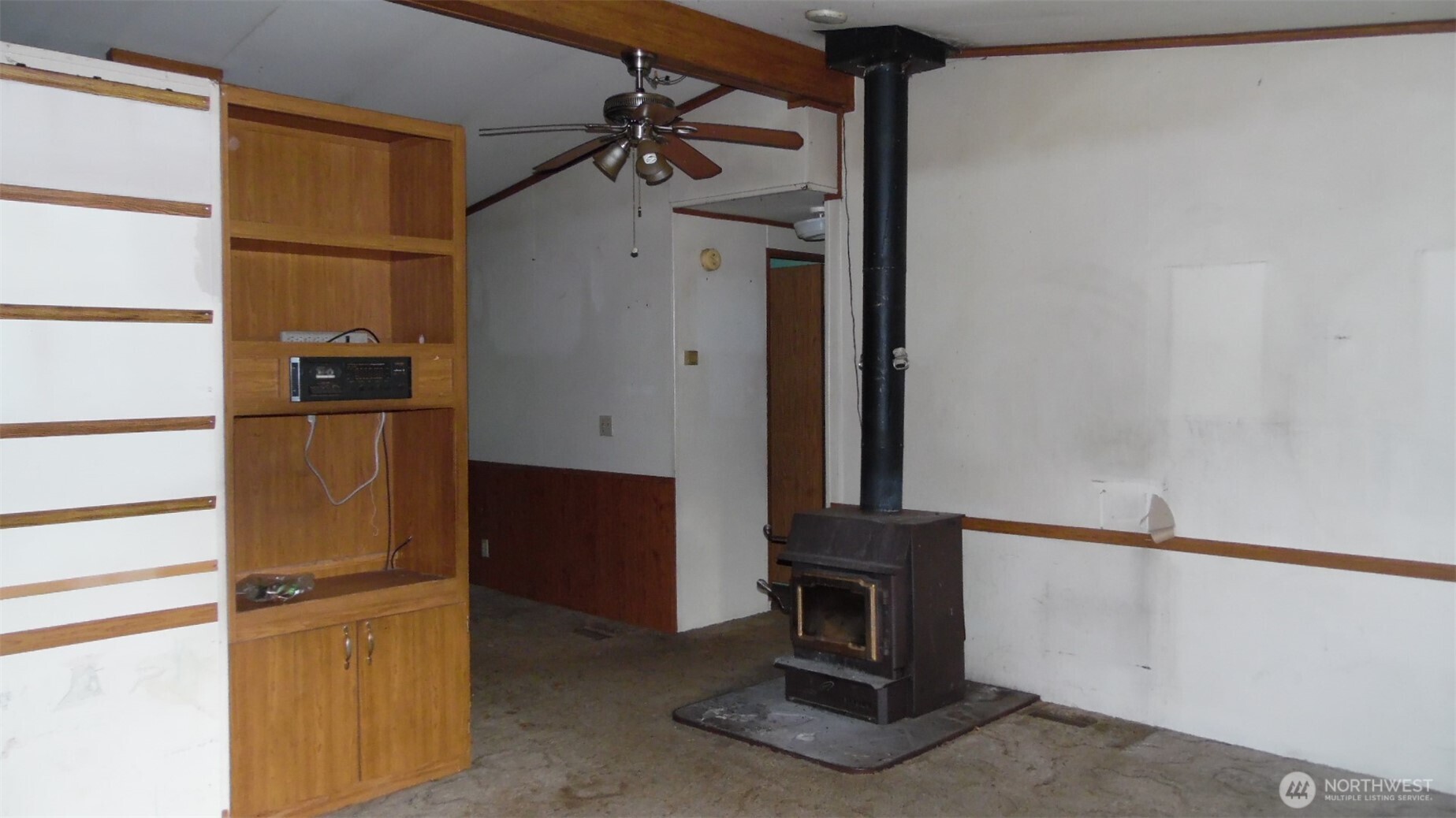 973 Davis Lake Road Morton, WA 98356 - Photo 4 of 23 a kitchen with stainless steel appliances a refrigerator and cabinets