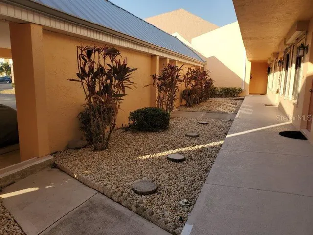 a view of backyard with green space
