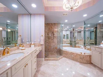 a utility room with sink dryer and washer