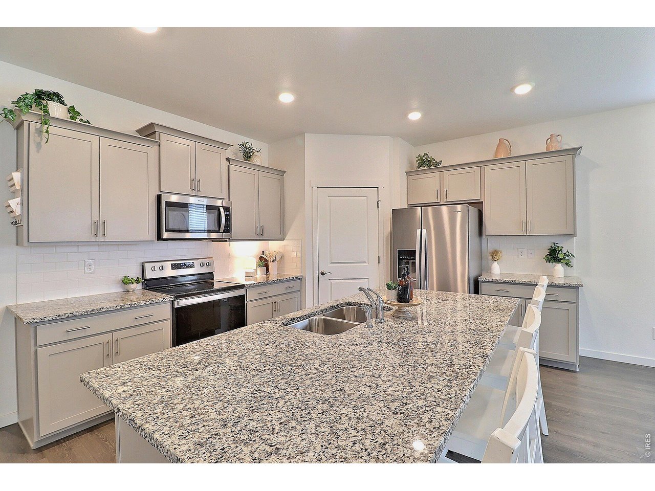 1269 Wild Basin Road Severance, CO 80550 - Photo 7 of 45 Large kitchen island, great for entertaining