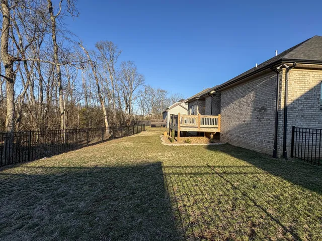 a view of back yard of the house