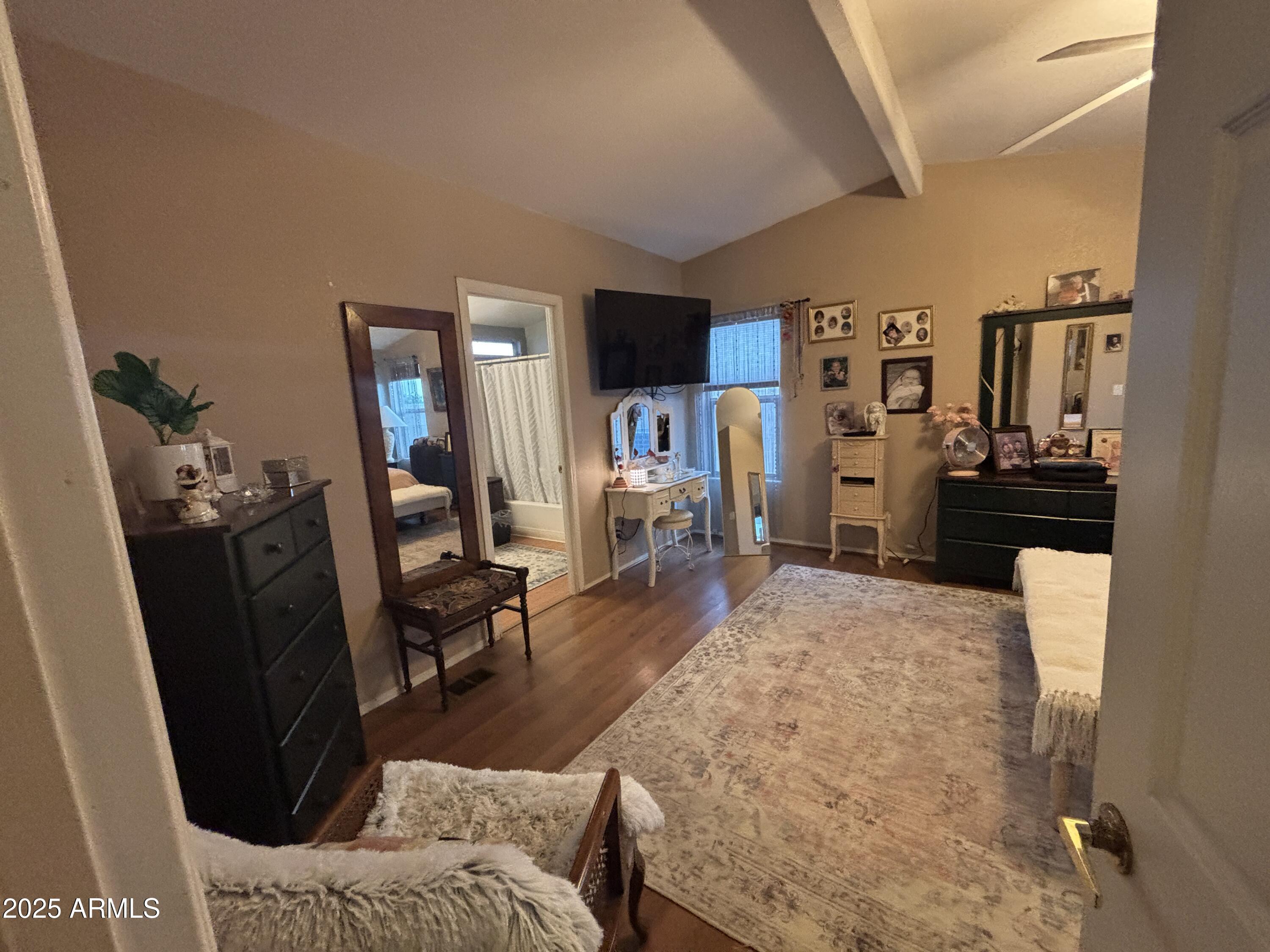 3500 South Tomahawk Road, Unit 153 Apache Junction, AZ 85119 - Photo 17 of 28 a living room with furniture window and a flat screen tv