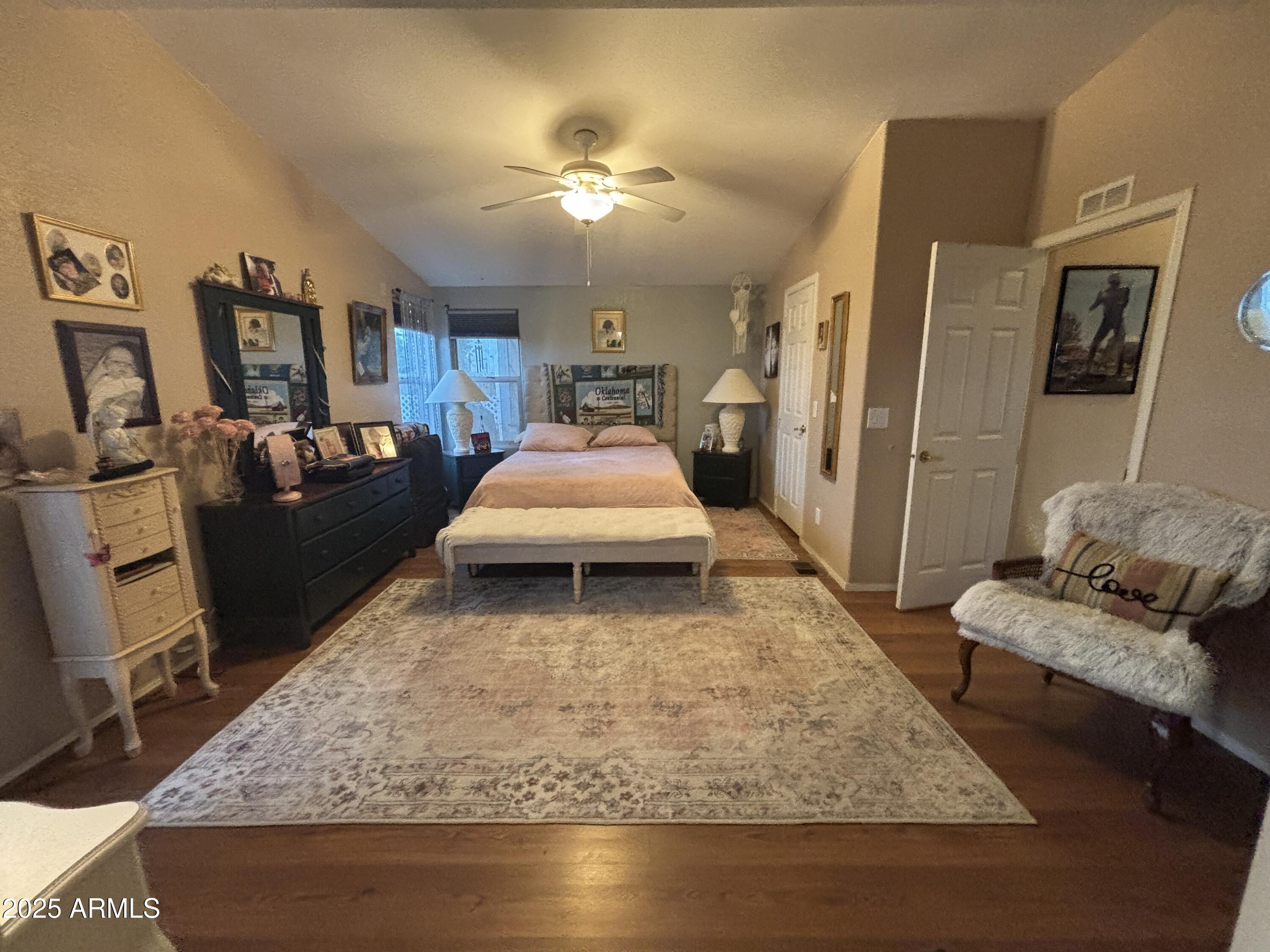 3500 South Tomahawk Road, Unit 153 Apache Junction, AZ 85119 - Photo 18 of 28 a living room with furniture and a flat screen tv