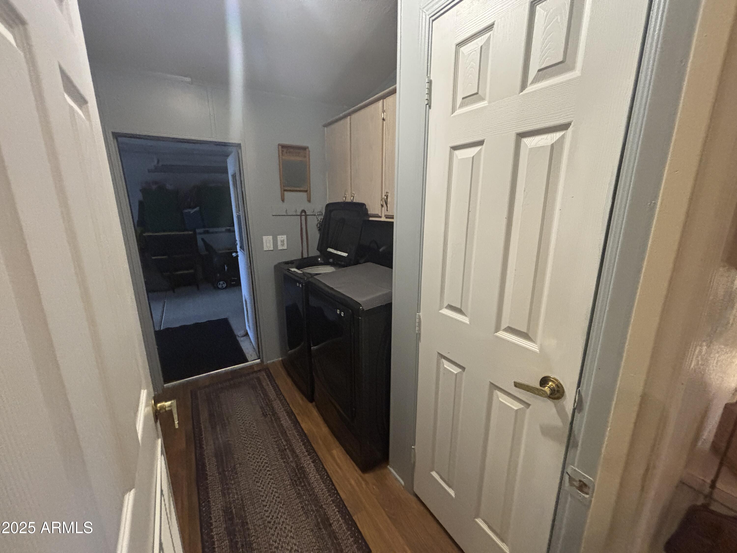 3500 South Tomahawk Road, Unit 153 Apache Junction, AZ 85119 - Photo 7 of 28 a bathroom with a sink a mirror and a shower
