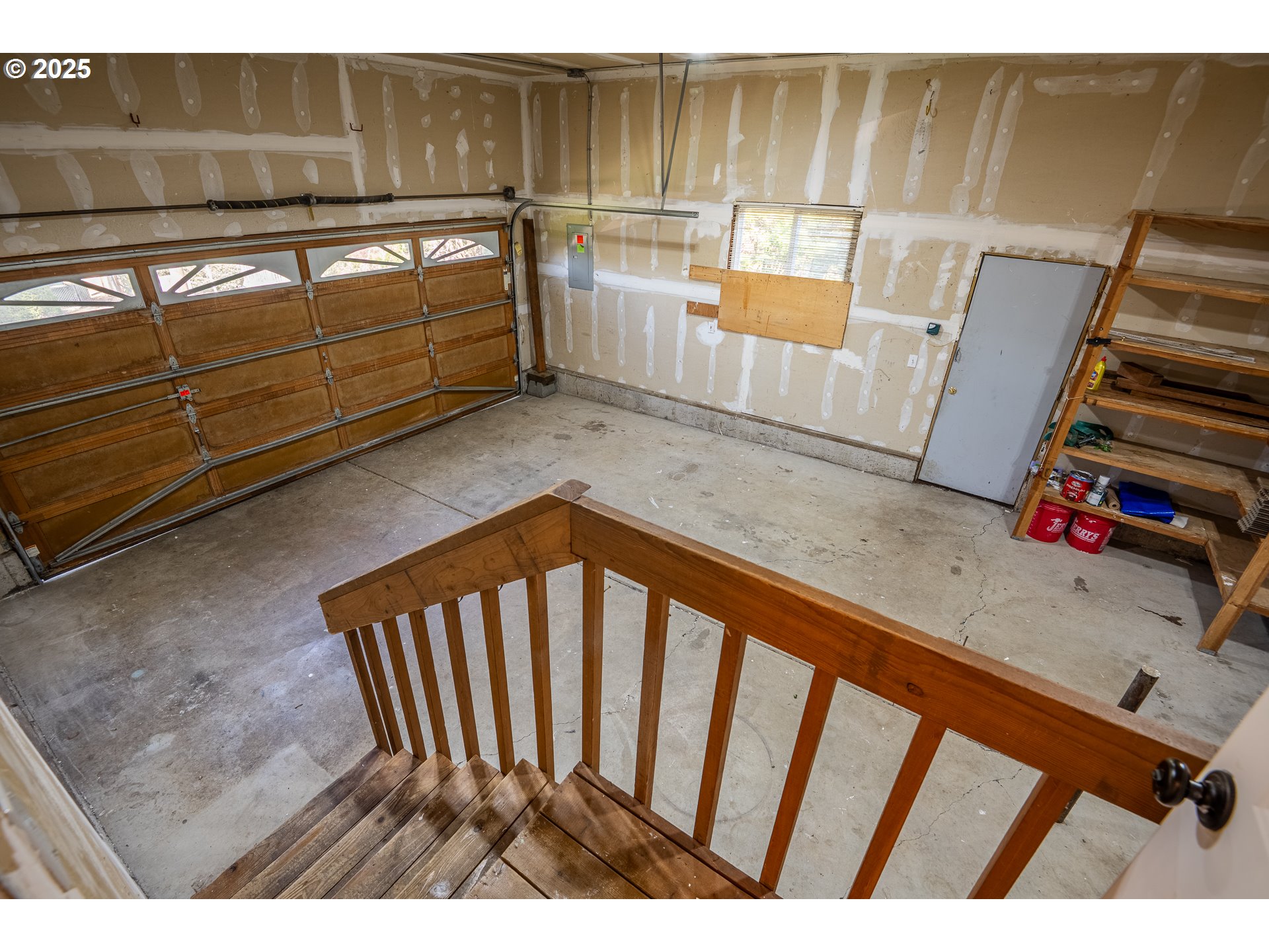7015 South E Street Springfield, OR 97478 - Photo 17 of 22 a view of a wooden bench in back of a building