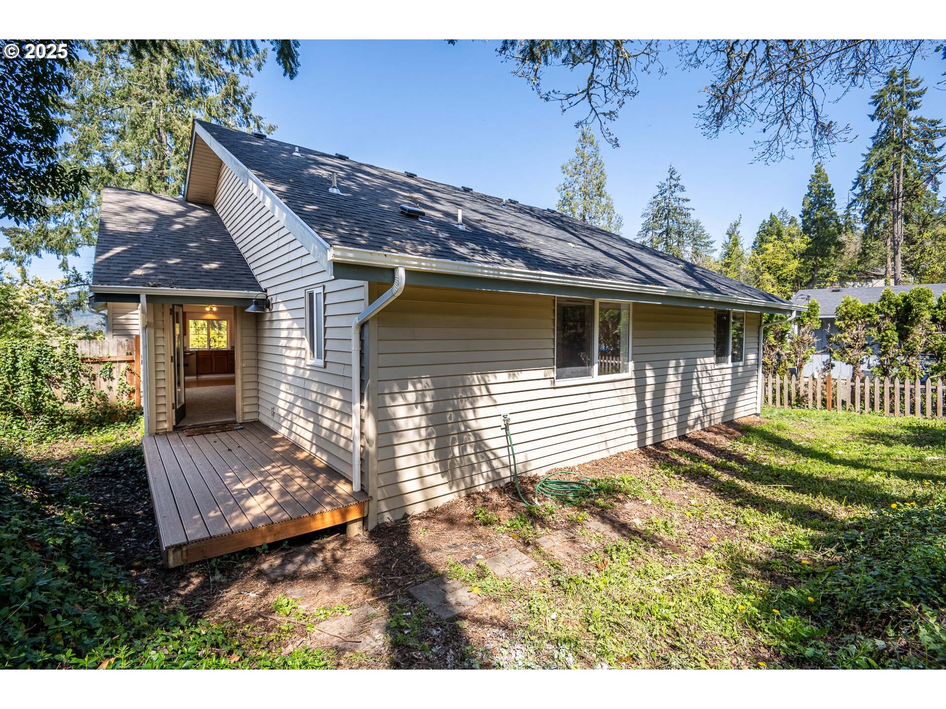 7015 South E Street Springfield, OR 97478 - Photo 18 of 22 a view of a house with a yard