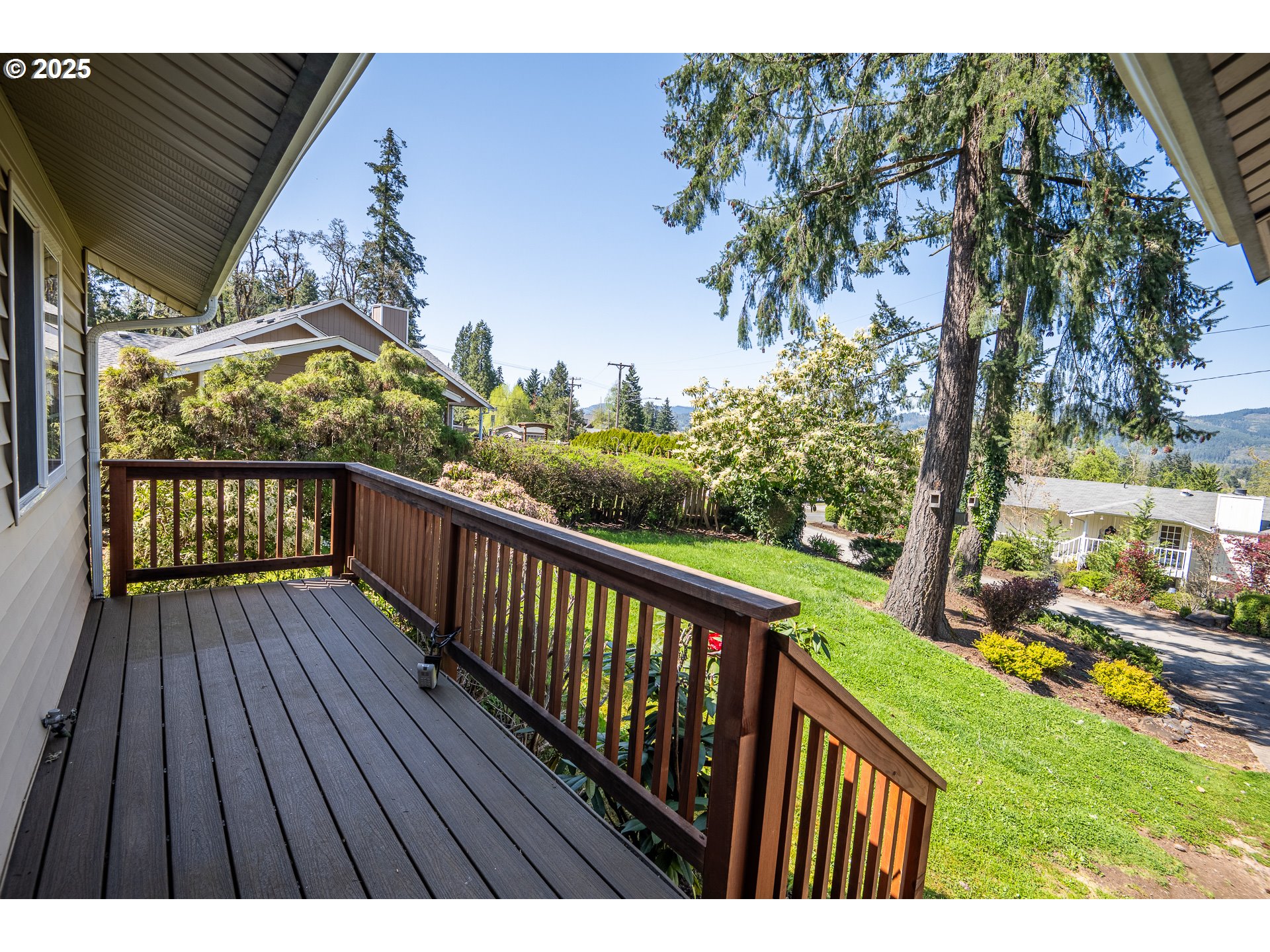 7015 South E Street Springfield, OR 97478 - Photo 4 of 22 a view of balcony with wooden floor