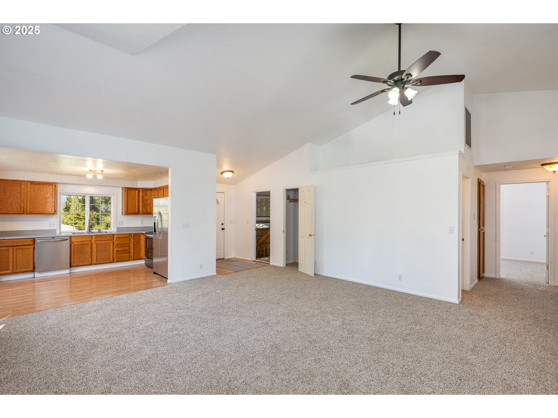 7015 South E Street Springfield, OR 97478 - Photo 7 of 22 a view of a livingroom with a ceiling fan