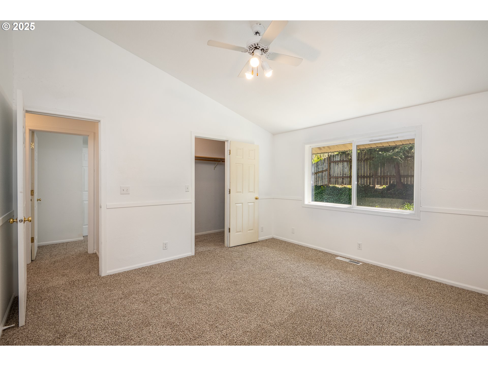 7015 South E Street Springfield, OR 97478 - Photo 9 of 22 a view of an empty room with a window