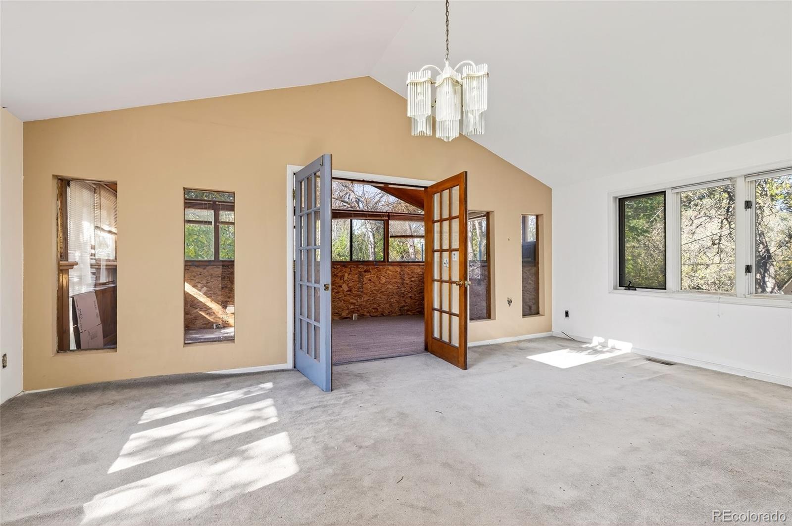 6795 West 31st Avenue Wheat Ridge, CO 80214 - Photo 6 of 35 a view of an empty room with a window