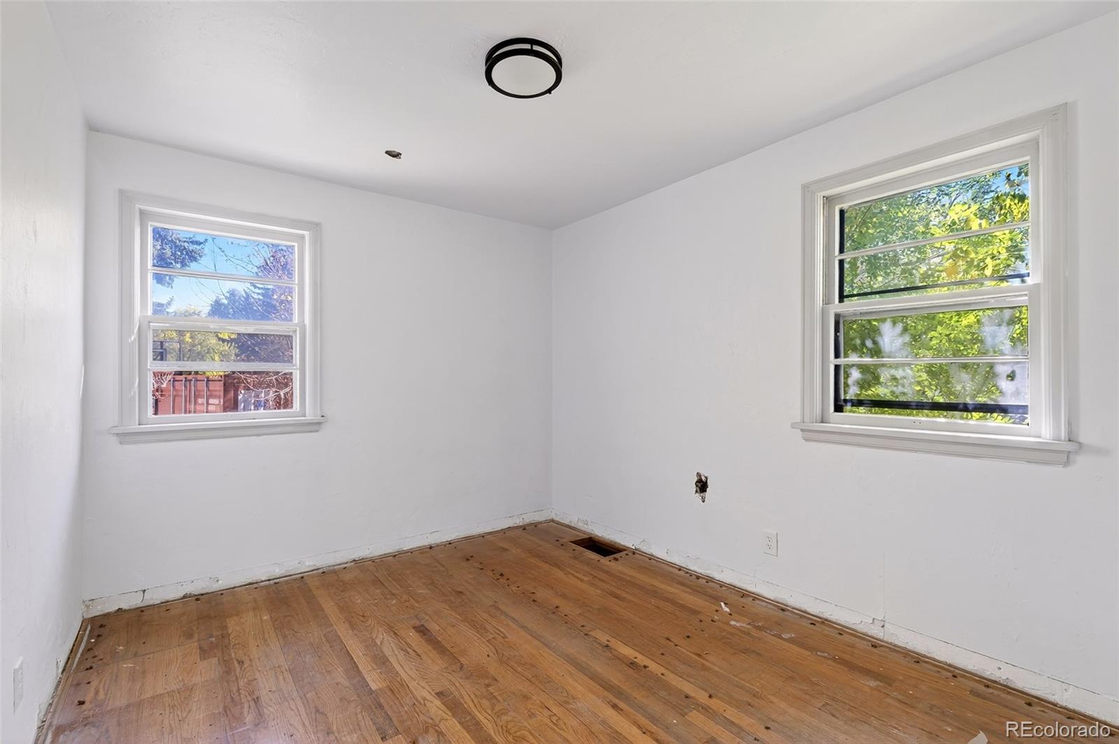 6795 West 31st Avenue Wheat Ridge, CO 80214 - Photo 9 of 35 a view of empty room with window