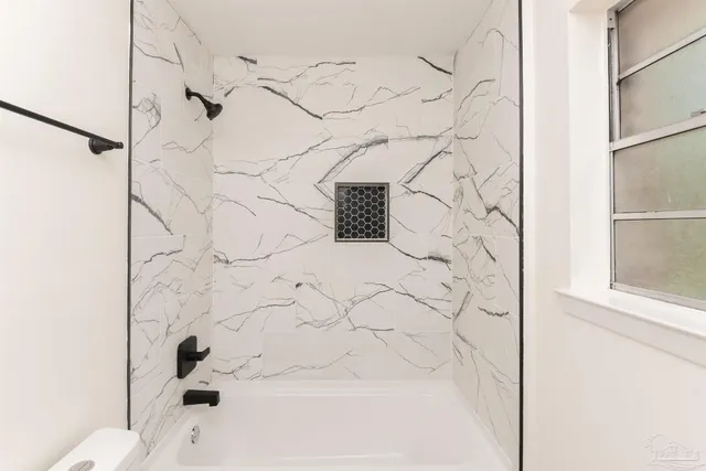 a bathroom with a bathtub