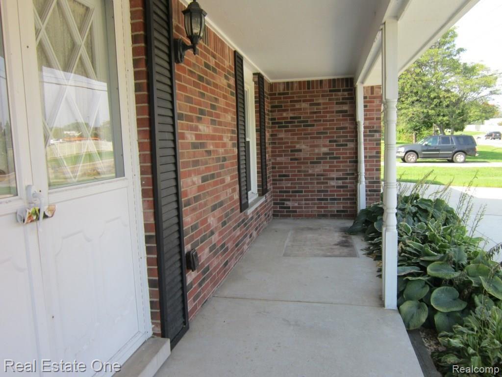 28865 West 11 Mile Road Farmington, MI 48336 - Photo 3 of 39 covered front porch.jpg