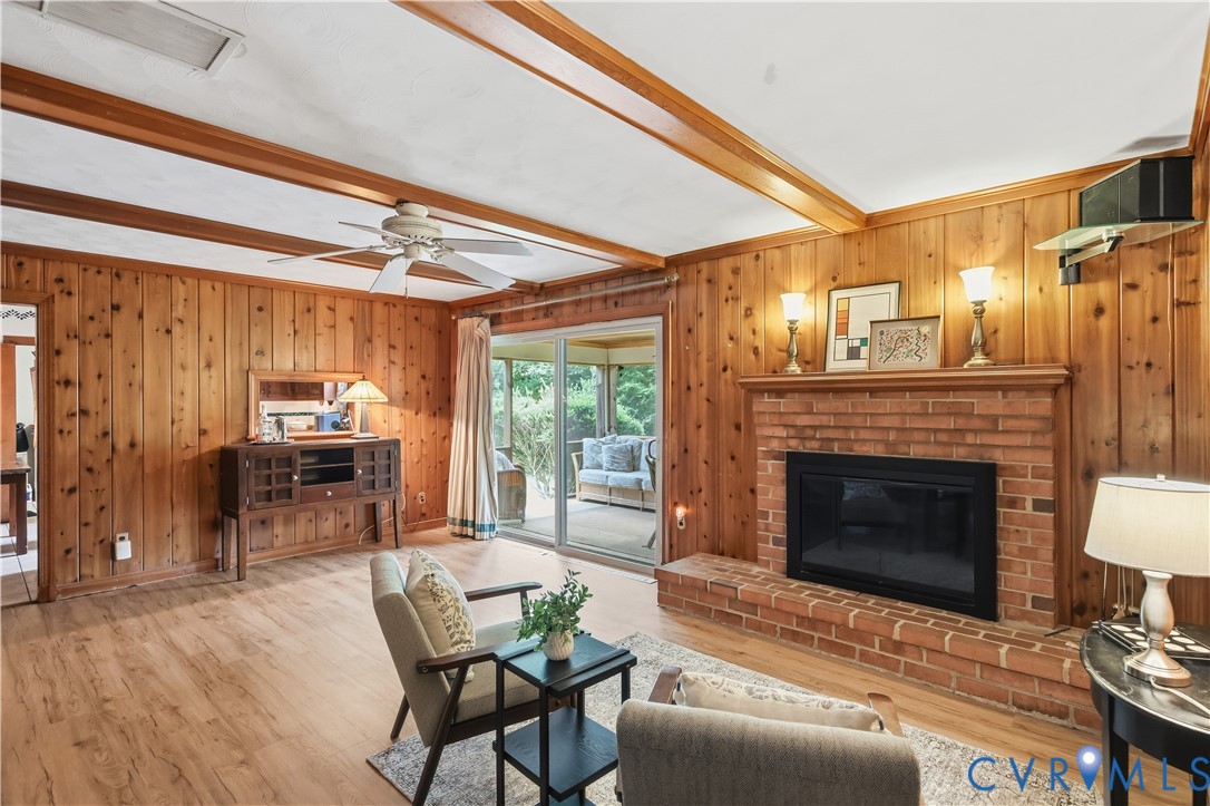 2500 Patricia Road Richmond, VA 23231 - Photo 14 of 34 Living room featuring wood-finish flooring, wood p