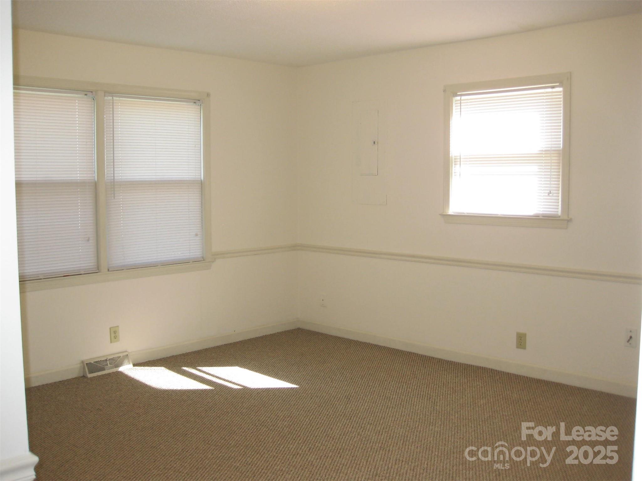 43226 Morrow Mountain Road Albemarle, NC 28001 - Photo 12 of 15 an empty room with a window