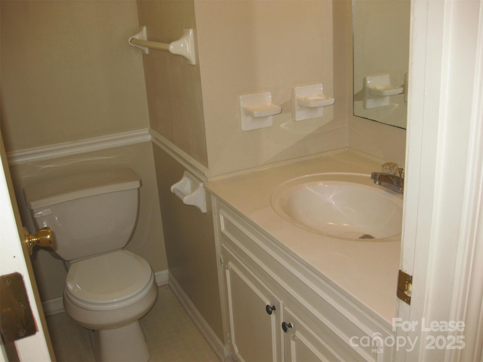 43226 Morrow Mountain Road Albemarle, NC 28001 - Photo 14 of 15 a bathroom with a sink and toilet