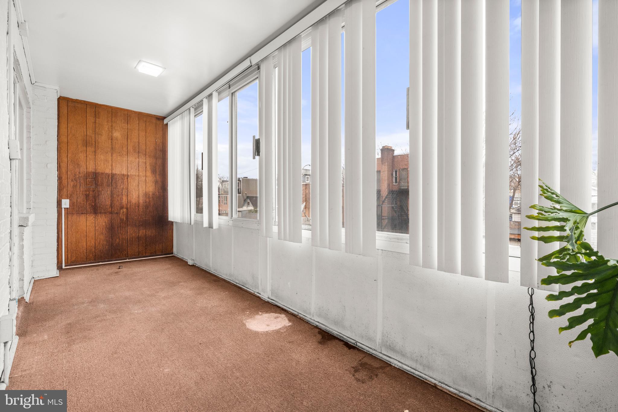 4108 Grant Street Northeast Washington, DC 20019 - Photo 16 of 31 a view of an empty room and a window