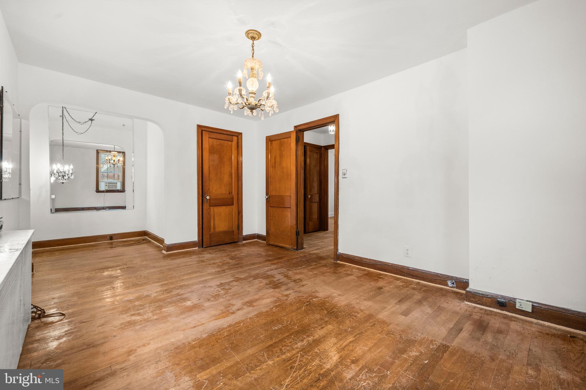 4108 Grant Street Northeast Washington, DC 20019 - Photo 21 of 31 a view of an empty room with a chandelier