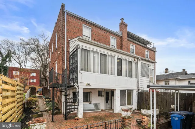 a view of swimming pool from a balcony