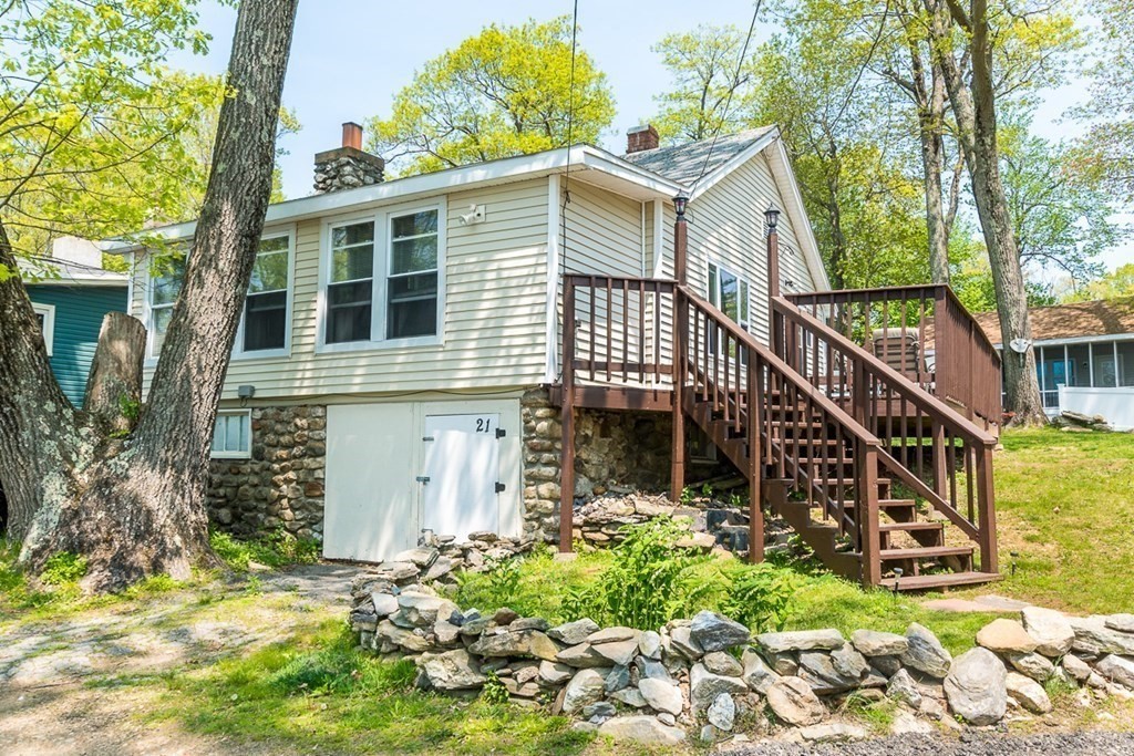 21 Victoria Avenue Rutland, MA 01543 - Photo 1 of 15 a view of a house with wooden fence