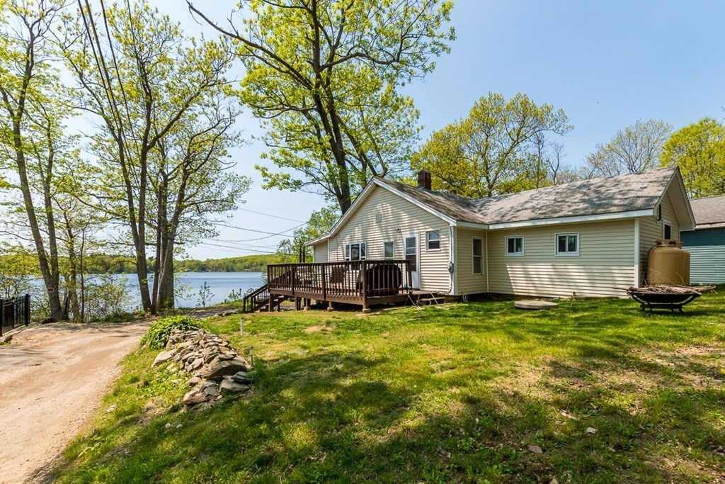 21 Victoria Avenue Rutland, MA 01543 - Photo 15 of 15 a view of a house with a big yard and large tree