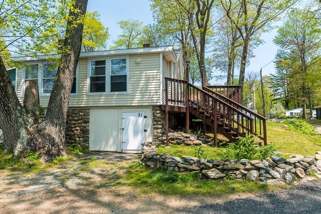 21 Victoria Avenue Rutland, MA 01543 - Photo 2 of 15 a view of a house with a yard