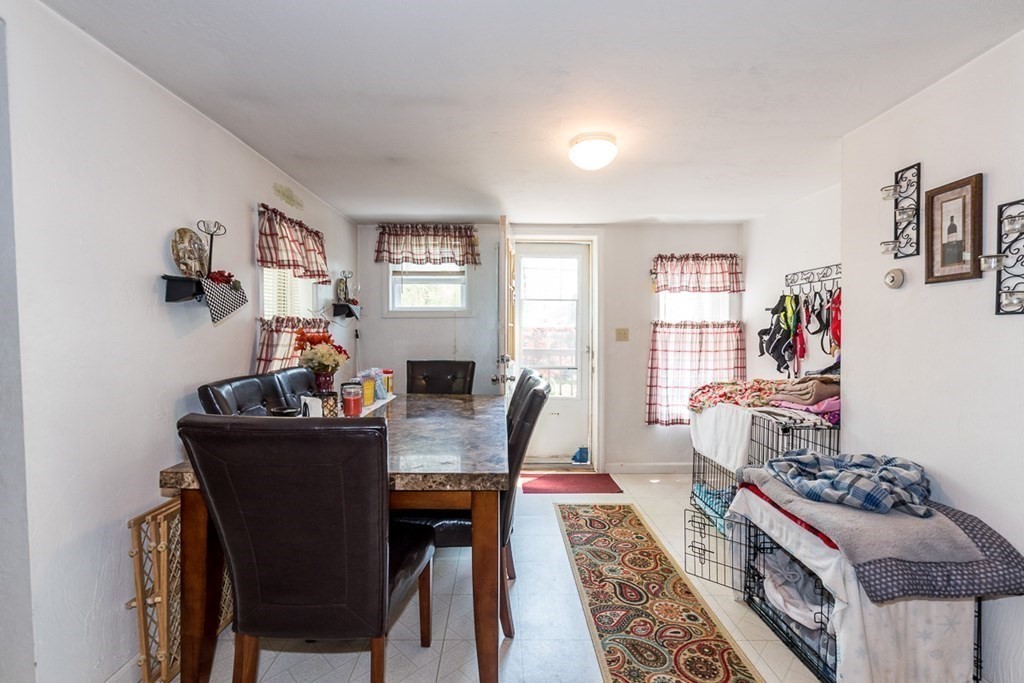 21 Victoria Avenue Rutland, MA 01543 - Photo 6 of 15 a view of a dining room with furniture and window