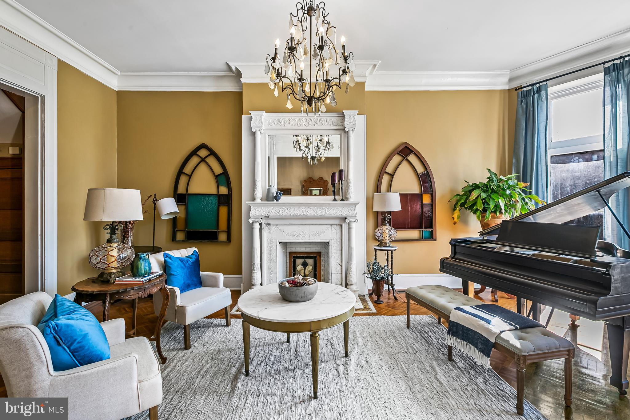 2243 Eutaw Place Baltimore, MD 21217 - Photo 11 of 54 a living room with furniture and a fireplace