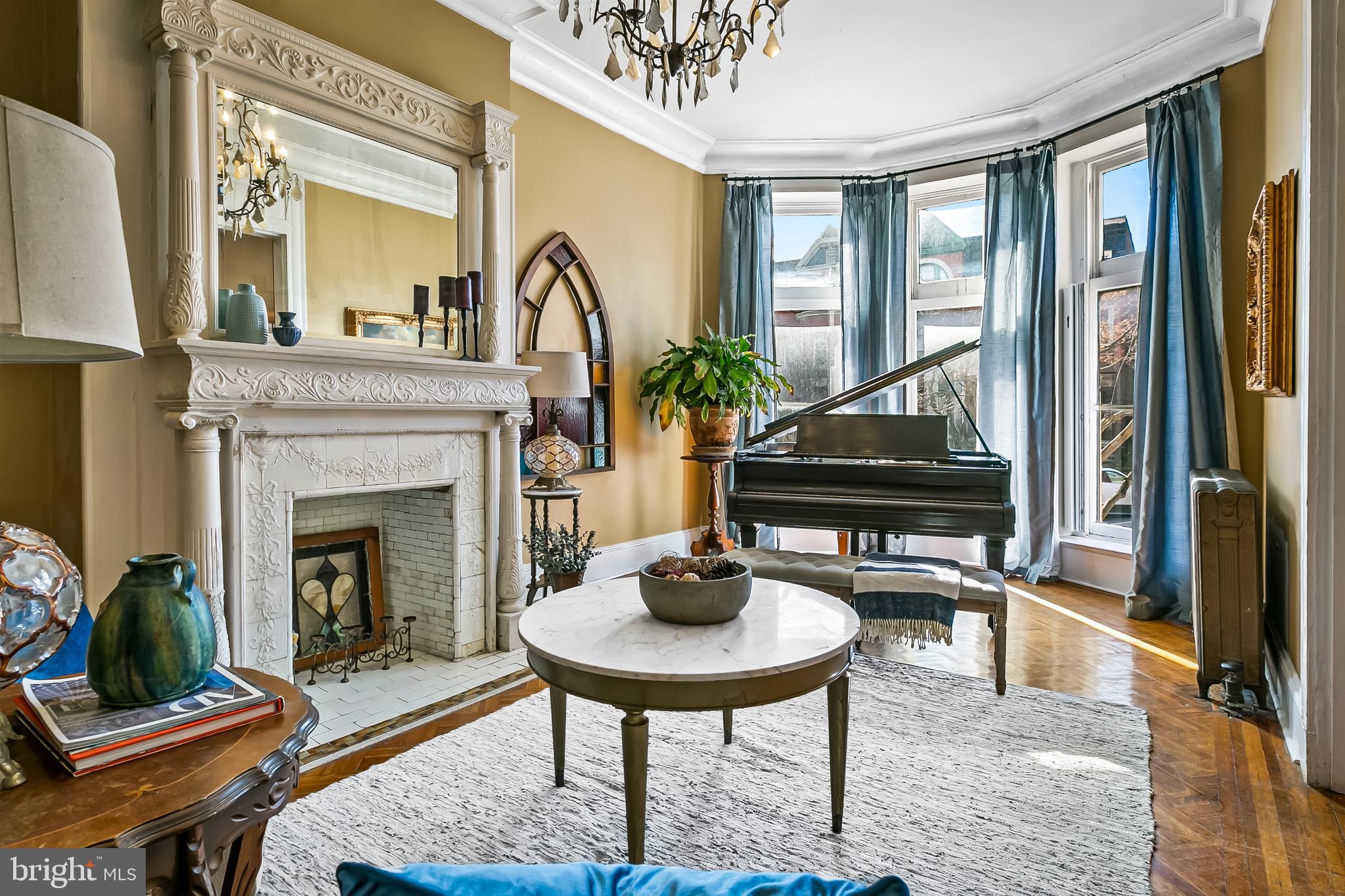 2243 Eutaw Place Baltimore, MD 21217 - Photo 12 of 54 a living room with furniture and a fireplace