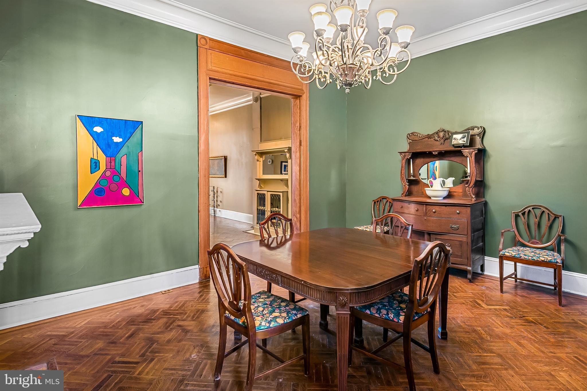 2243 Eutaw Place Baltimore, MD 21217 - Photo 22 of 54 a view of a dining room with furniture and chandelier