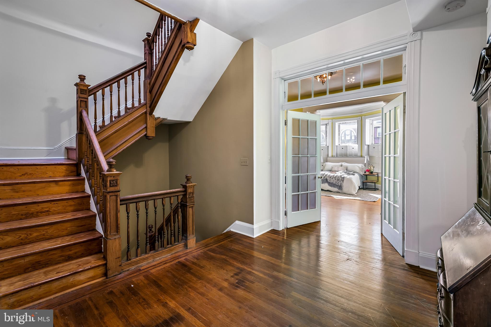 2243 Eutaw Place Baltimore, MD 21217 - Photo 32 of 54 a view of an entryway with wooden floor and a front door