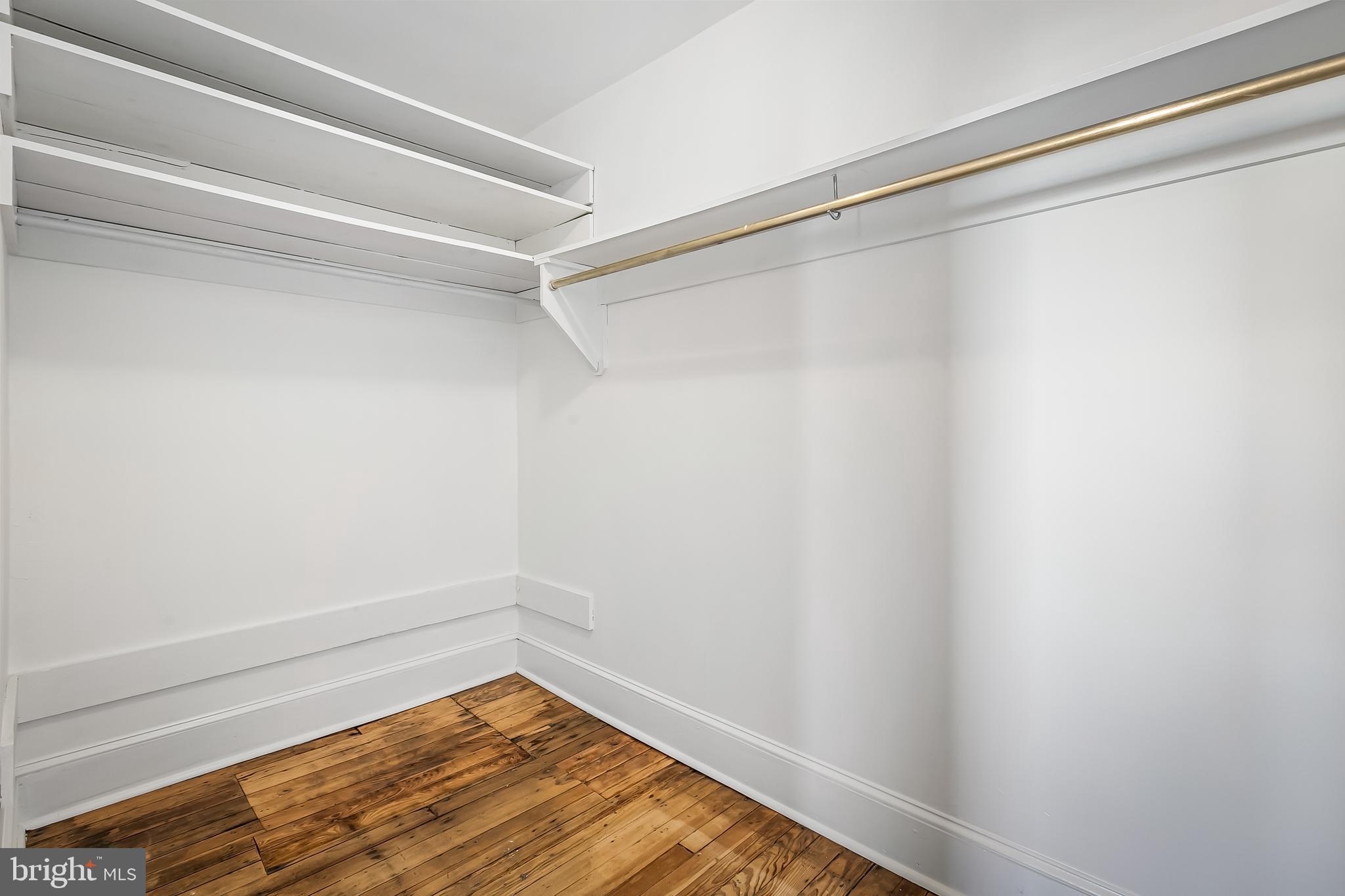 2243 Eutaw Place Baltimore, MD 21217 - Photo 49 of 54 a view of a room with wooden floor and closet