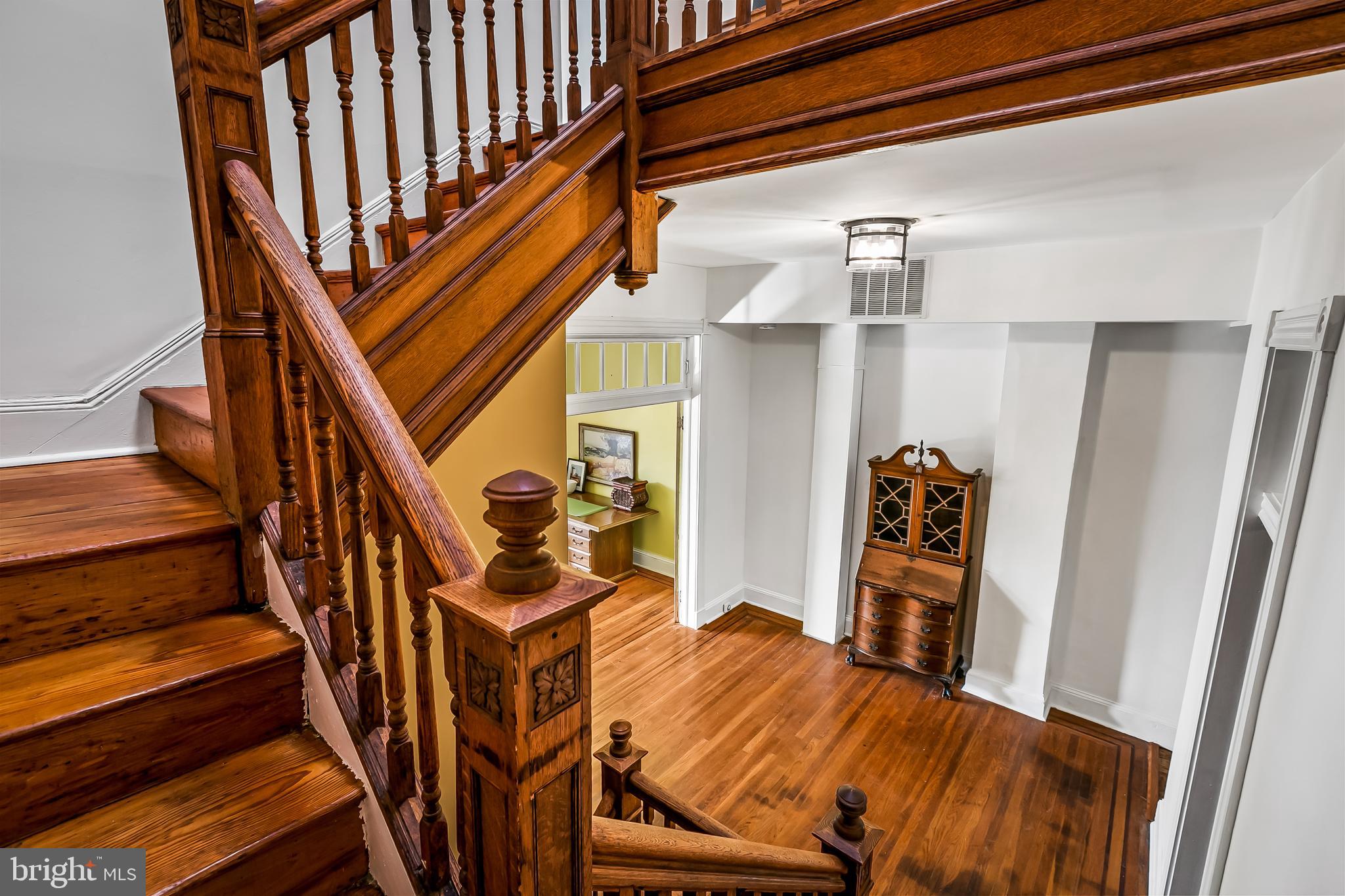 2243 Eutaw Place Baltimore, MD 21217 - Photo 50 of 54 a view of staircase with wooden floor and stairs