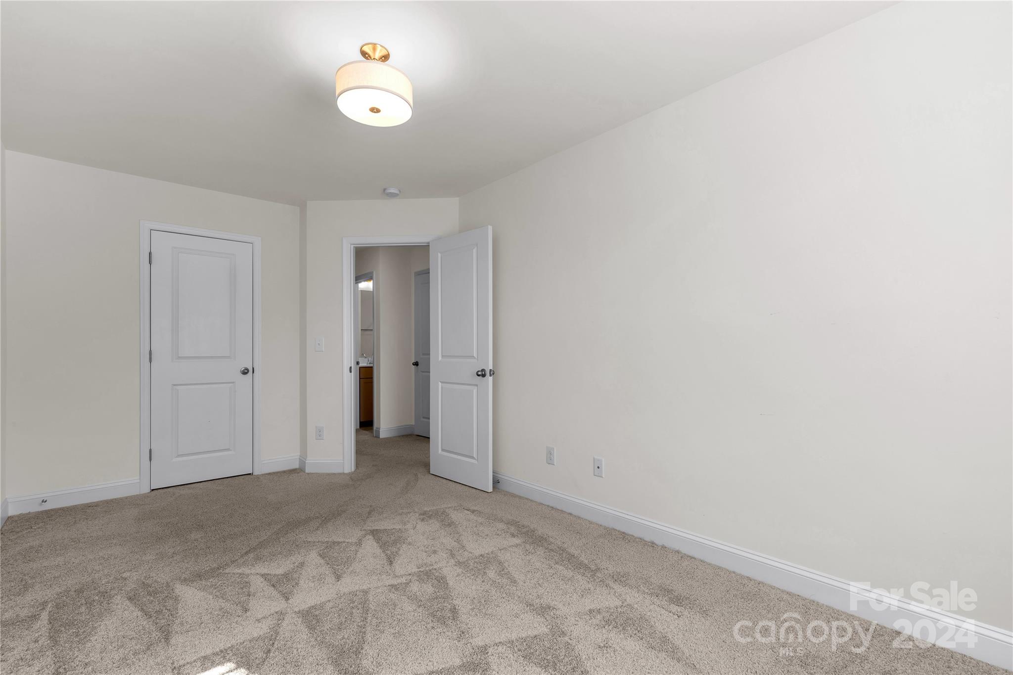 2026 Sutton View Road, Unit 693 Fort Mill, SC 29708 - Photo 19 of 26 a view of an empty room with a window