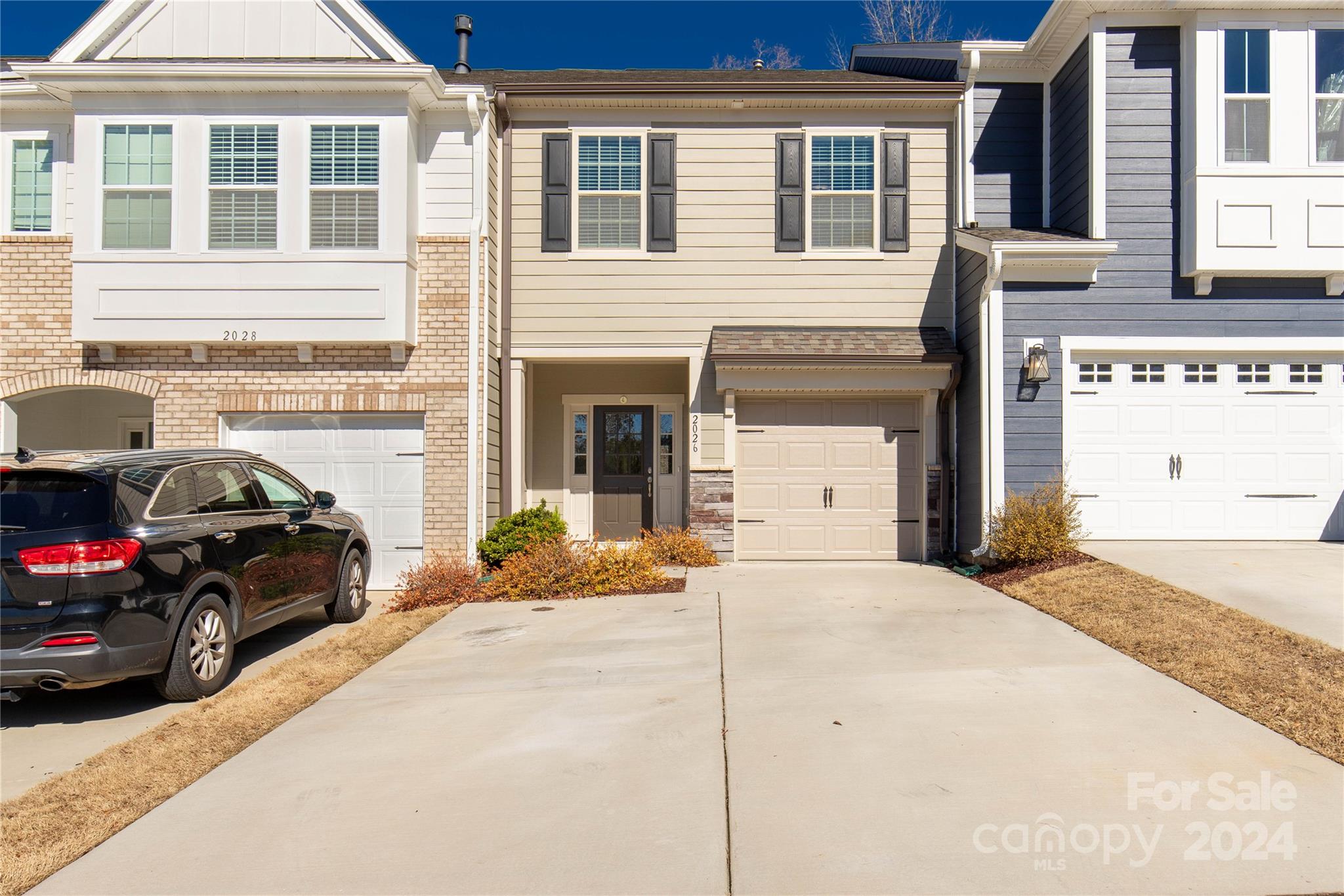 2026 Sutton View Road, Unit 693 Fort Mill, SC 29708 - Photo 2 of 26 a car parked in front of a house